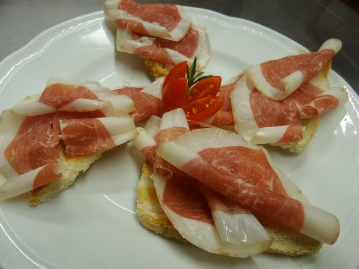 Al Fogolar Hotel Villa Santina Bagian luar foto